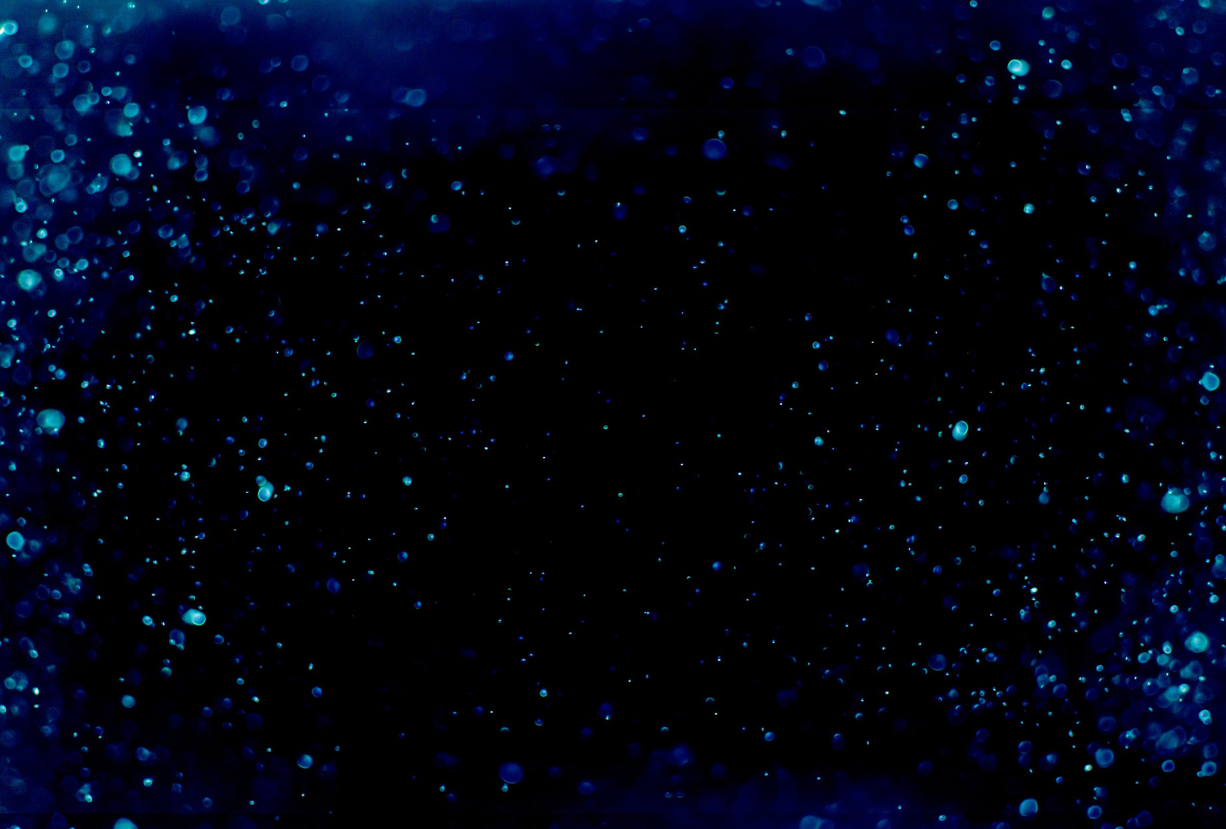 Blue Bokeh on Black Background